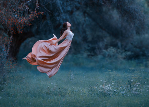 image of angel-like lady floating up to the sky